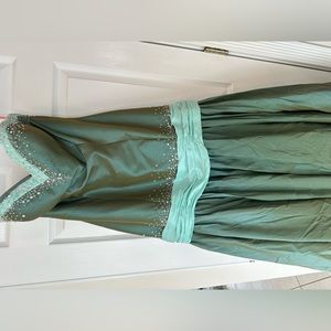 Olive green with light teal accents